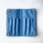 Blue canvas double zip pen case viewed from above with visible hardware and zippers