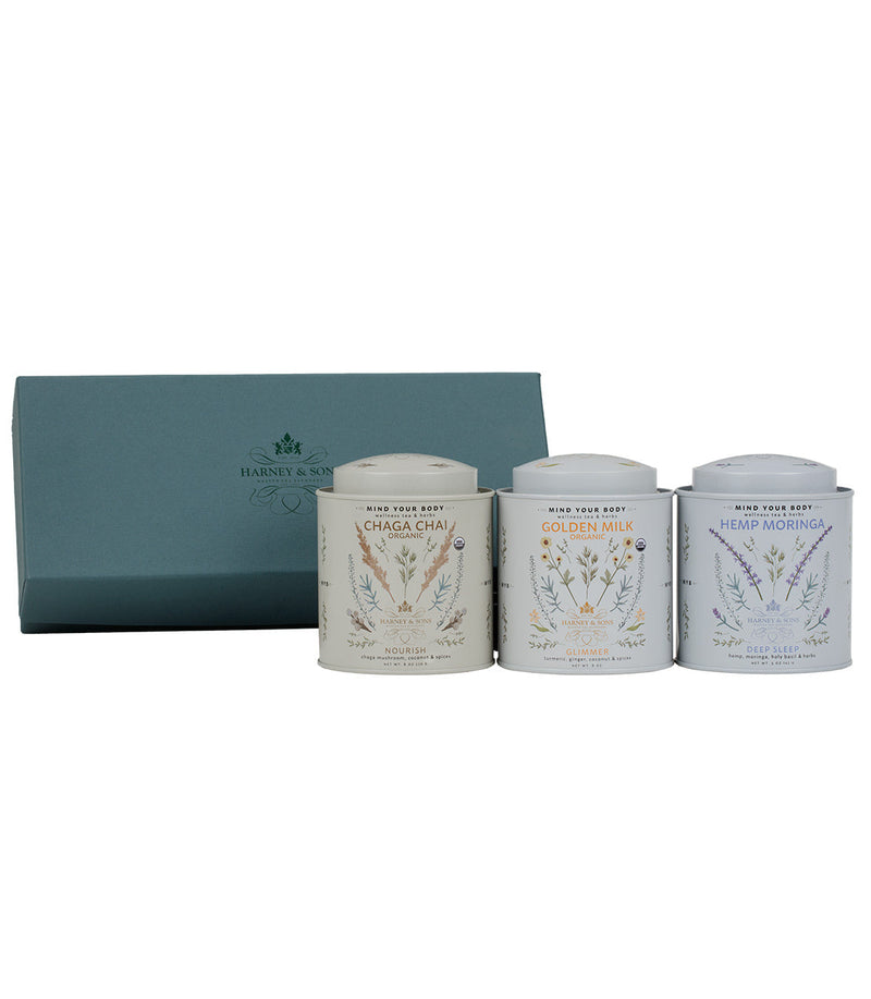 Wellness Trio Gift tea set with three decorative tins and a teal gift box